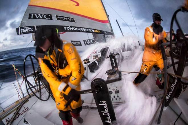 Onboard Abu Dhabi Ocean Racing - Luke Parko Parkinson turns away quick as another wave envelops the cockpit of Azzam after sunset in the Southern Ocean - Leg five to Itajai -  Volvo Ocean Race 2015 © Matt Knighton/Abu Dhabi Ocean Racing